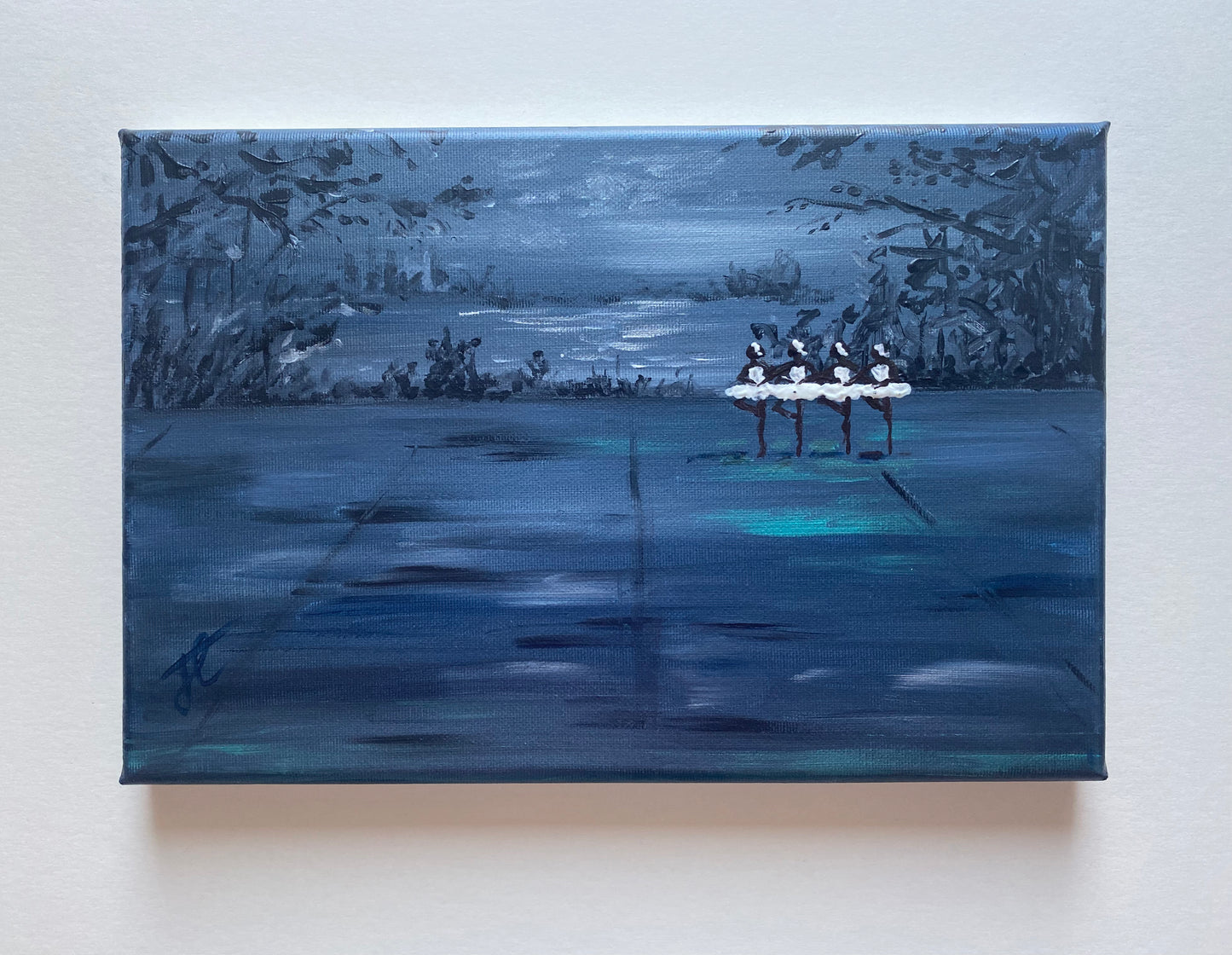 Painting shown against light background: Painting of ballet stage with four dancers performing the dance of the little swans. They are positioned towards the back of the stage. The backdrop has trees and a lake.