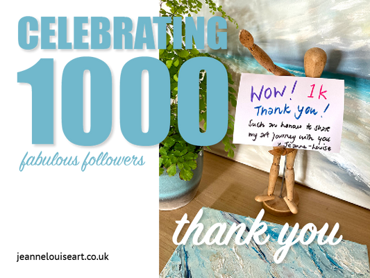 Layout with headline text "Celebrating 1000 fabulous followers" and a picture of an artist mannequin holding a placard with a handwritten thank you message. 