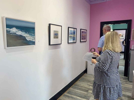 People in an exhibition room