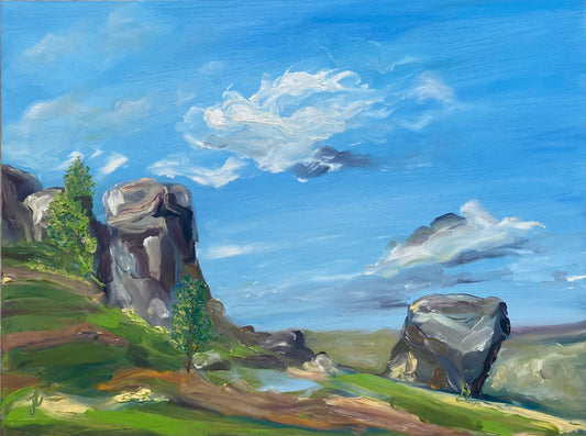 Vibrant oil painting of Ilkley cow and calf rock formation with blue sky and clouds