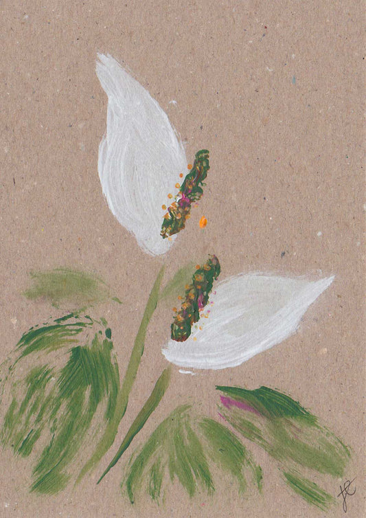 Greetings card with artistic depiction of white peace lily flowers and green leaves on a textured brown background