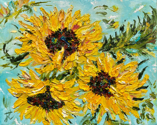vibrant impasto painting of 3 sunflower blooms and leaves against a soft turquoise background
