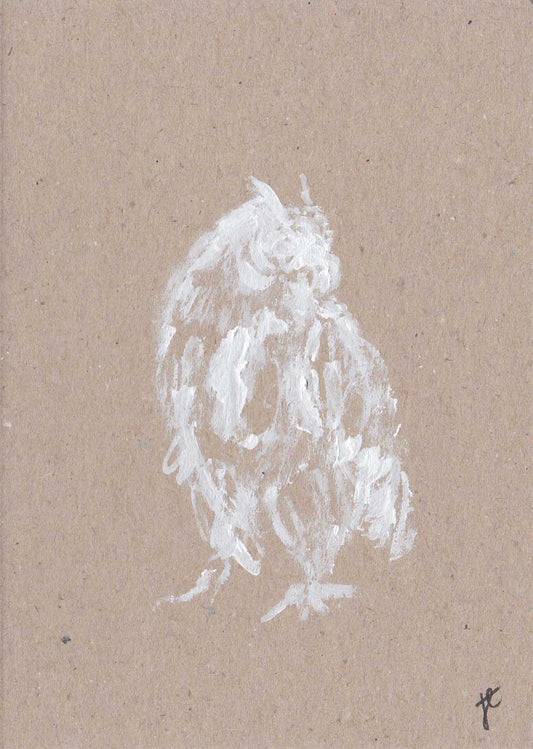 An owl is painted in white on the kraft surface of this original greetings card