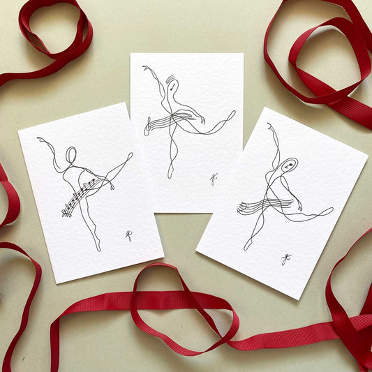 Trio of continuous line stylised ballerina greetings cards with music notation inspiration tutus