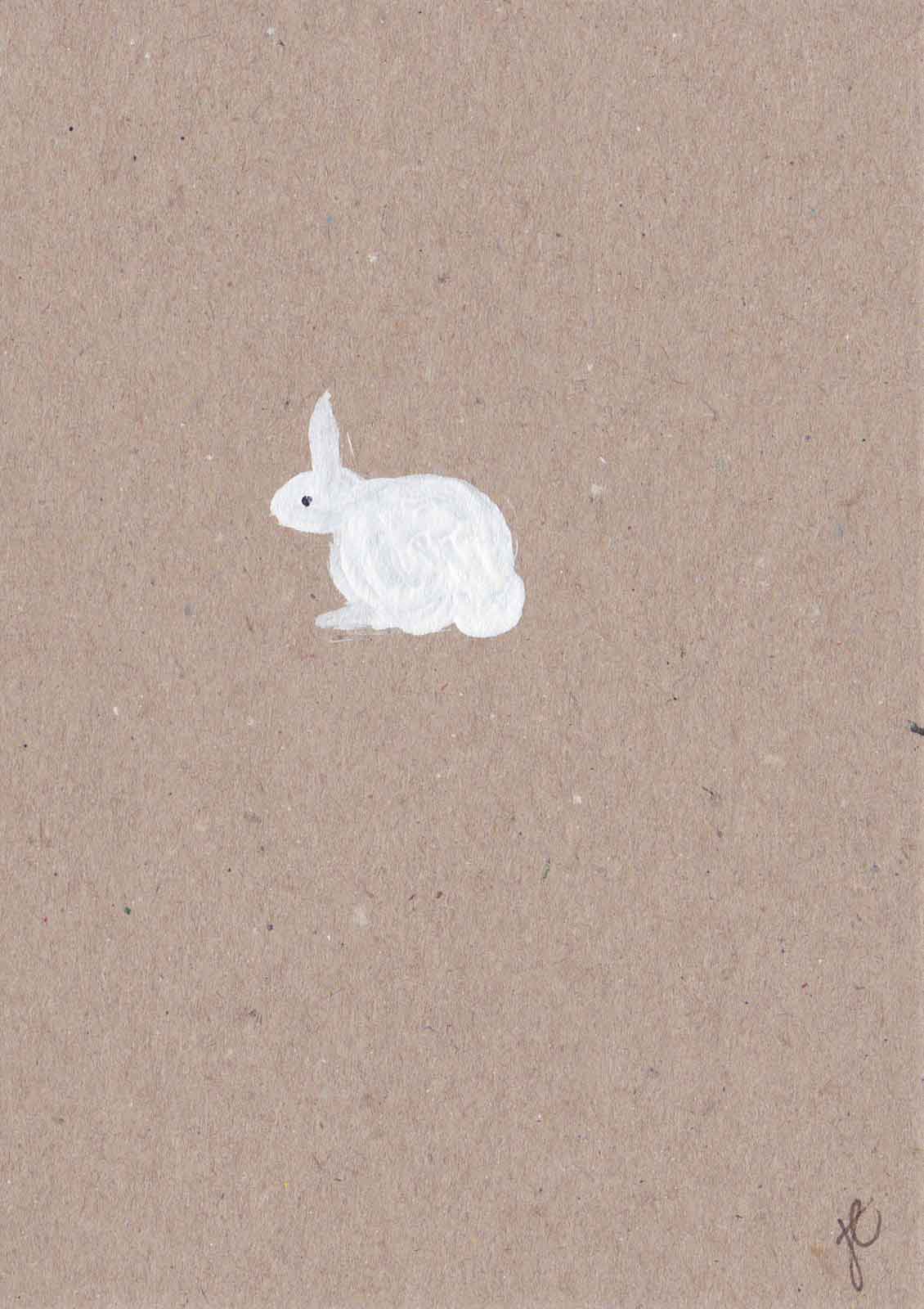 White bunny painted on kraft card