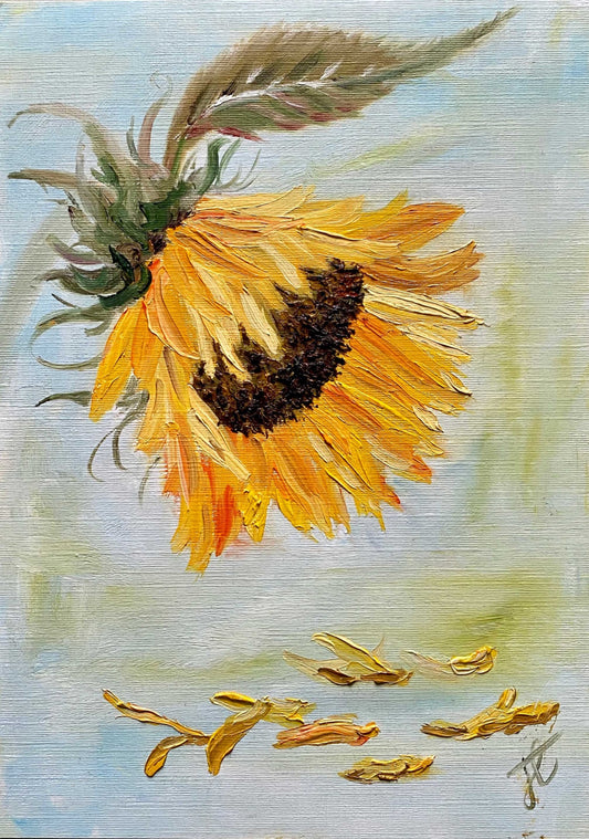 Painting study of sunflower bloom and leaf with dropped petals.